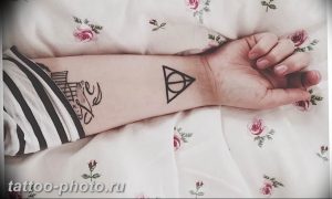 фото тату треугольник с кругом 11.12.2018 №033 - triangle with - tattoo-photo.ru